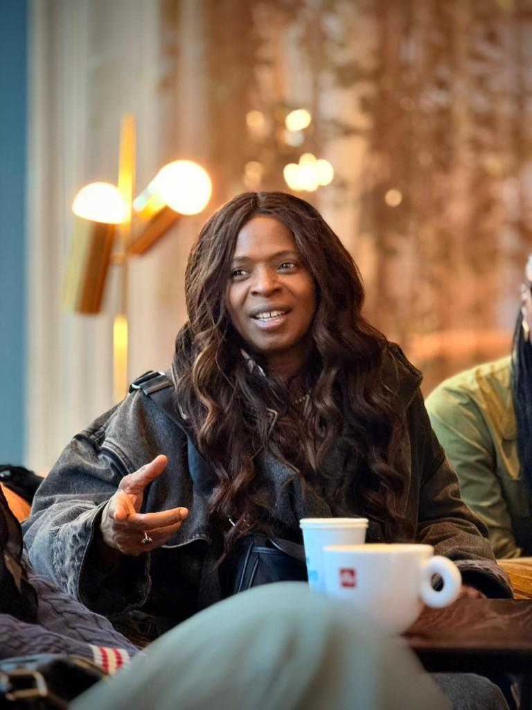 Phadera Flash, property strategist, engaging in consultation